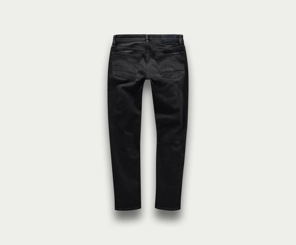 Achteraanzicht van The N01 Slim Black Used jeans van Blue Rivet Jeans, met subtiele stiksels op de zakken en plat gelegd tegen een lichte achtergrond. Deze premium jeans hebben een klassiek design met riemlussen en een rechte pijp.